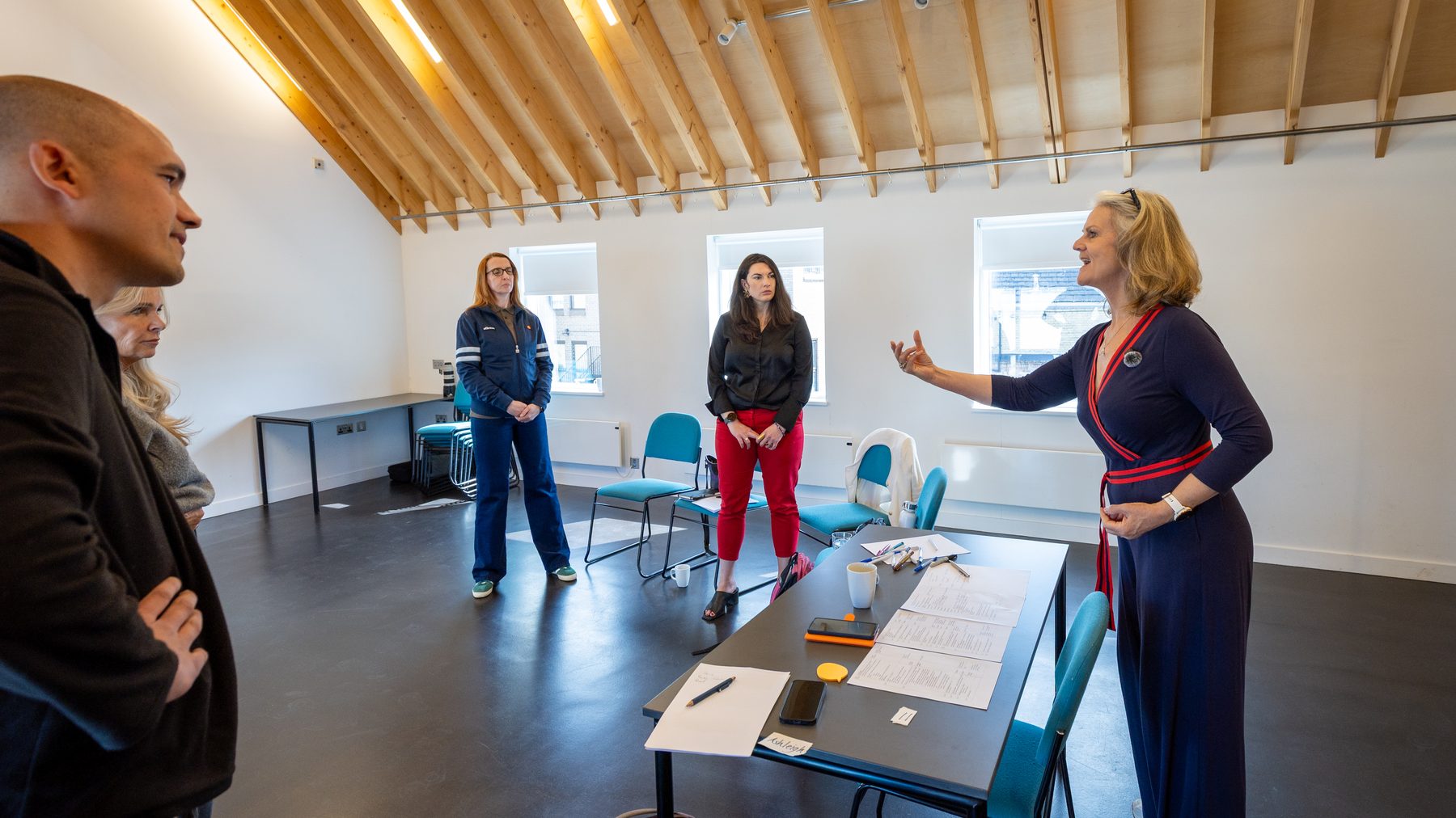 Jill working with a group of business owners